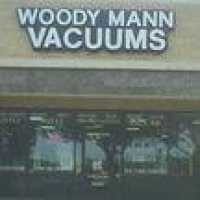 Woody Mann Vacuums Logo