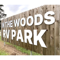 In the Woods RV Park Logo