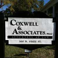 Coxwell & Associates, PLLC Logo