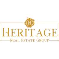 The Walker Sales Team at Heritage Real Estate Group Logo
