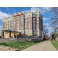 Hampton Inn and Suites by Hilton Cincinnati Midtown Rookwood Logo