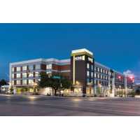 Home2 Suites by Hilton Fort Worth Cultural District Logo