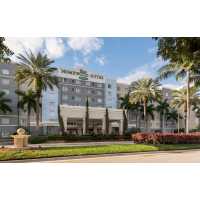 Homewood Suites by Hilton Miami-Airport/Blue Lagoon Logo
