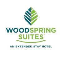 WoodSpring Suites Augusta Fort Eisenhower Logo