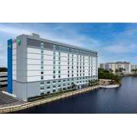 Home2 Suites by Hilton Miami Airport South Blue Lagoon Logo