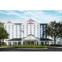 Hilton Garden Inn Orlando at SeaWorld Logo