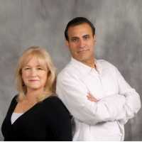Jorge & Angela at Seville Properties Logo