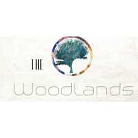 Woodlands Apartments Logo