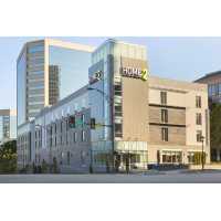 Home2 Suites by Hilton Greenville Downtown Logo