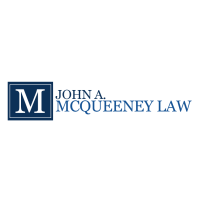 John A. McQueeney Law Logo