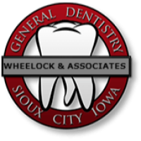 Wheelock and Associates Dentistry Logo