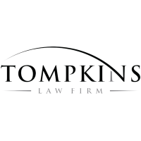 Tompkins Law Firm Logo