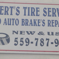 Robert's Tire Service and Auto Brakes Repair Logo
