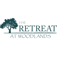 The Retreat at Woodlands Logo