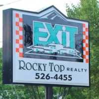 Kim Milligan - EXIT Rocky Top Realty Logo