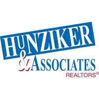 Paul Livingston - Hunziker & Associates, REALTORS Logo