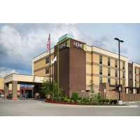 Home2 Suites by Hilton Muskogee Logo
