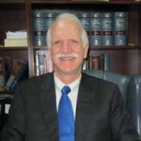 Ralph M. Hinman, Attorney at Law Logo