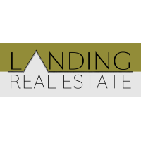 Katie Thibodeau - Maine Real Estate Co. Logo