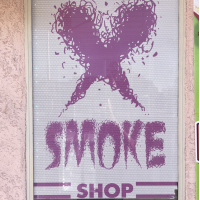 X SMOKE SHOP Logo