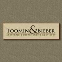 Toomin & Bieber Comprehensive Dentistry Logo