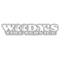 Woody's Tire Service Logo