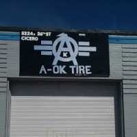 A - Ok towing & Tire Logo
